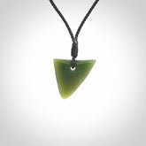 Hand carved pounamu niho, drop pendant. Jade necklace hand made in New Zealand.